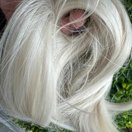 Tillstyle creamy white straight hair bun