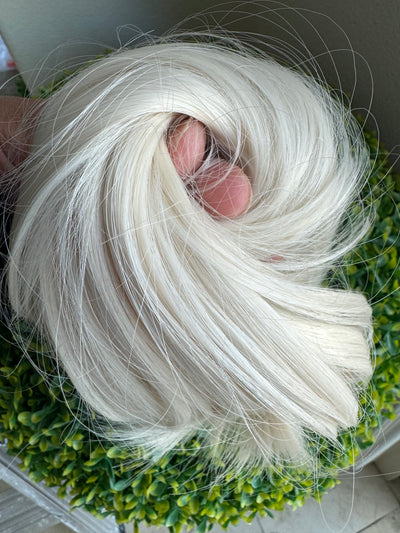 Tillstyle creamy white straight hair bun