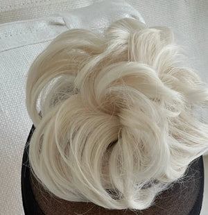 #Creme_blonde_messy-hair-bun