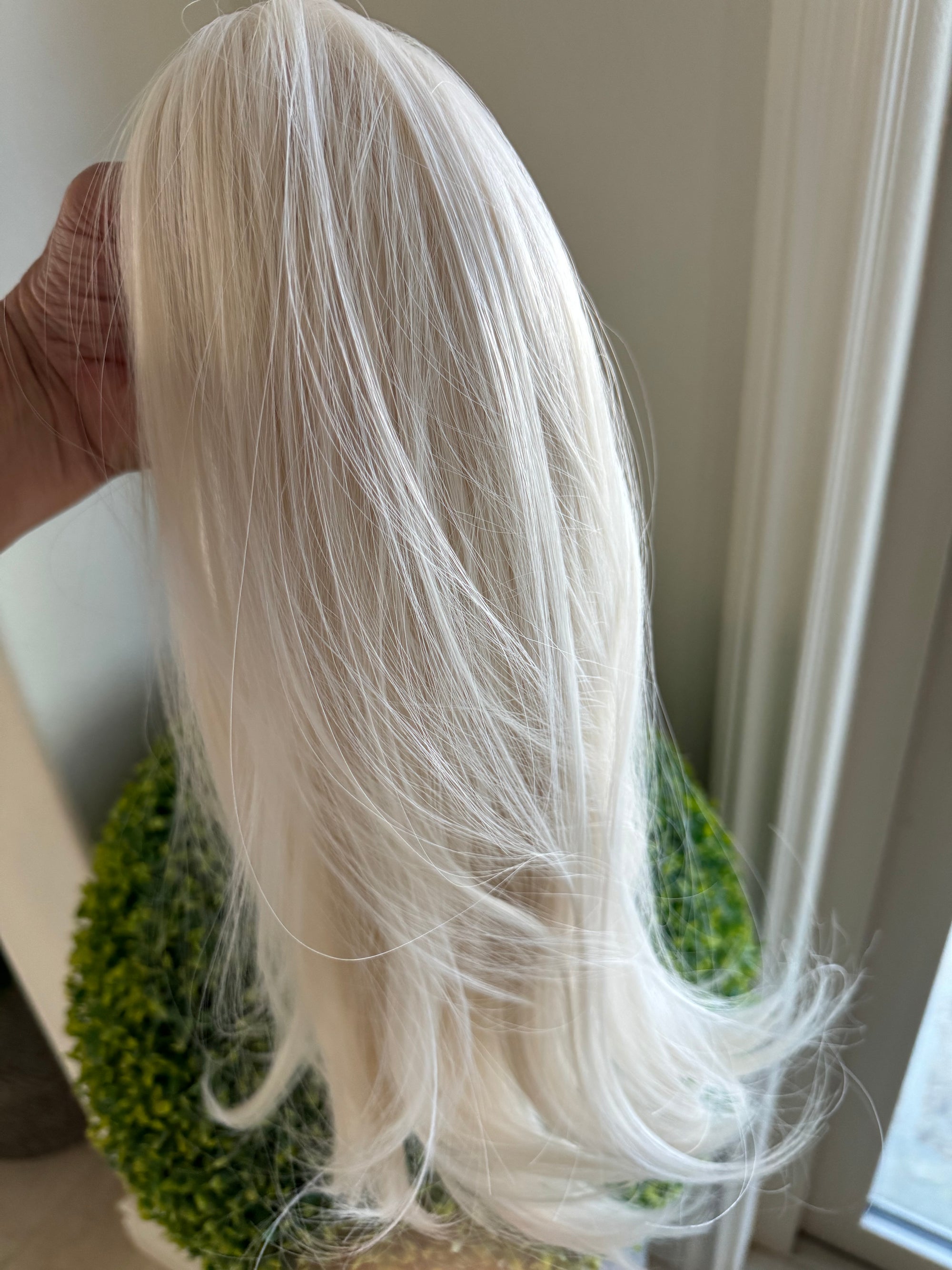 White blonde claw clip pony tail