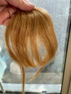 Tillstyle clip in human hair french bangs  honey blonde