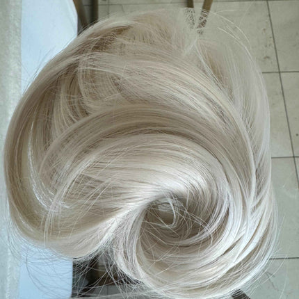 Tillstyle pale white straight hair bun